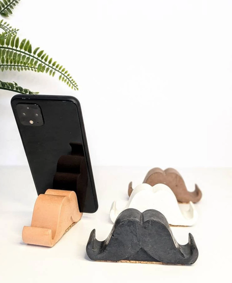 Moustache phone holder