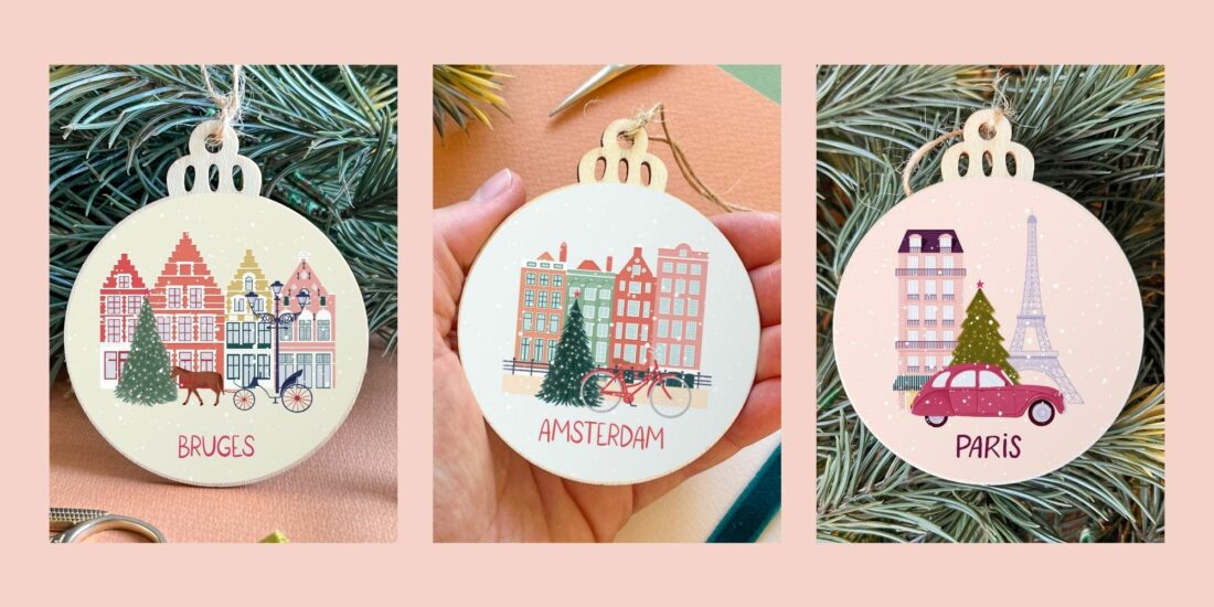 Travel-themed Christmas tree ornaments depicting snowy cities from across the world.